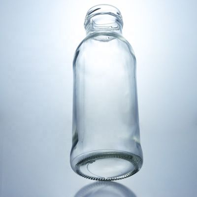 Bouteille en verre transparent pour boissons Populaire 100ml260ml 500ml 1000ml Bouteille ronde avec bouchon à vis