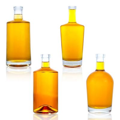 Bouteille de vin de forme ovale transparente 500 ml 700 ml 750 ml avec bouchons pour boissons