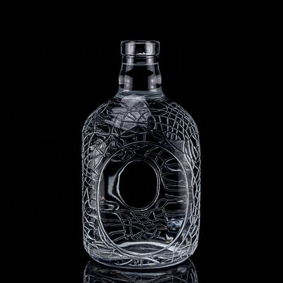 Bouteille en verre ronde sculptée 700 ml 750 ml Vodka Bouteille en verre Bouteille de vin avec type d'étanchéité en liège