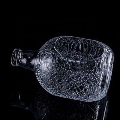 Bouteille en verre ronde sculptée 700 ml 750 ml Vodka Bouteille en verre Bouteille de vin avec type d'étanchéité en liège
