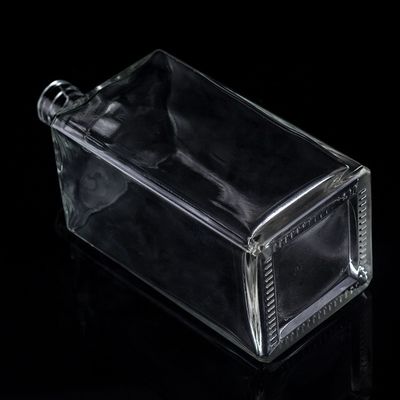 Impression par écran Bouteille en verre transparent de 1000 ml pour la vodka en forme carrée avec bouchon à vis