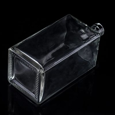 Impression par écran Bouteille en verre transparent de 1000 ml pour la vodka en forme carrée avec bouchon à vis