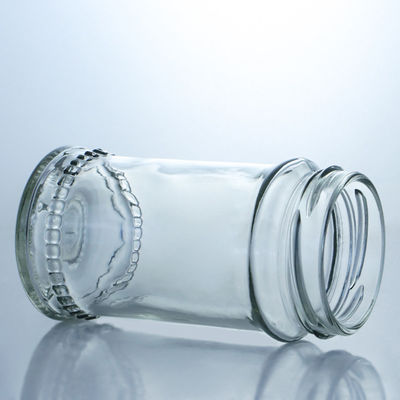 Contenant alimentaire Couvercle métallique Bouteilles de miel en verre transparent pour le stockage de confiture de miel sur mesure
