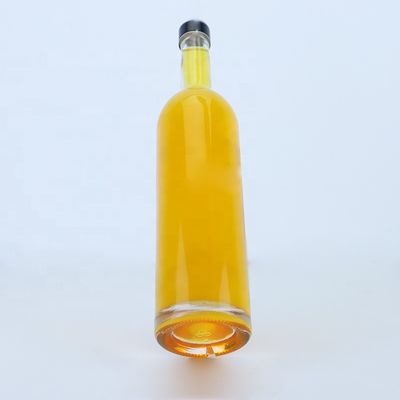 Logo personnalisé 700ml 750ml Bouteille en verre de forme ronde à haute pierre avec finition supérieure à vis