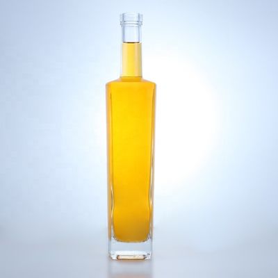Bouteille en verre de liqueur en forme ronde de 700 ml avec logo personnalisé et finition en liège