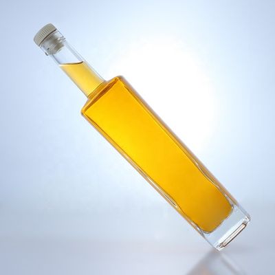 Bouteille en verre de liqueur en forme ronde de 700 ml avec logo personnalisé et finition en liège