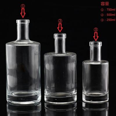 Bouteille en verre transparent avec un cou court et un corps gras 500 ml 750 ml