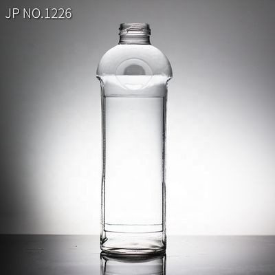 Bouteille en verre d'eau minérale de 750 ml avec bouchon à vis type de scellement pour l'eau bénite