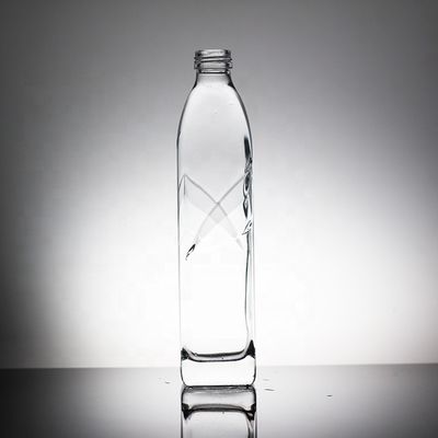 Bouteille en verre d'eau minérale de 750 ml avec bouchon à vis type de scellement pour l'eau bénite