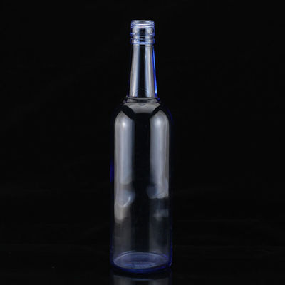 Fabrication à la sérigraphie de luxe Bouteille de vodka bleue de forme ronde pour l'industrie de l'alcool et du gin