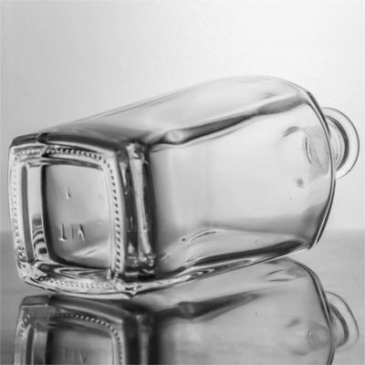 Bouteille en verre carré unique pour le whisky, la vodka, la tequila, le gin, le rhum, le liège inclus
