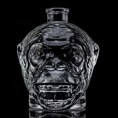Conception unique 500 ml 750 ml Bouteille en verre en forme de tête de singe pour la vodka Liqueur avec liège
