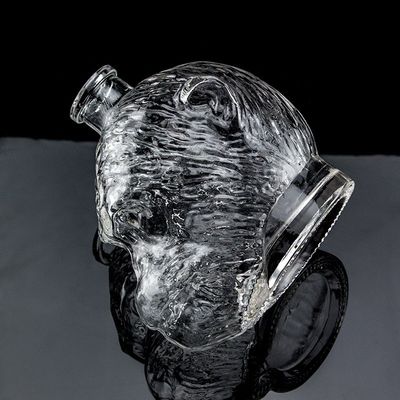Conception unique 500 ml 750 ml Bouteille en verre en forme de tête de singe pour la vodka Liqueur avec liège