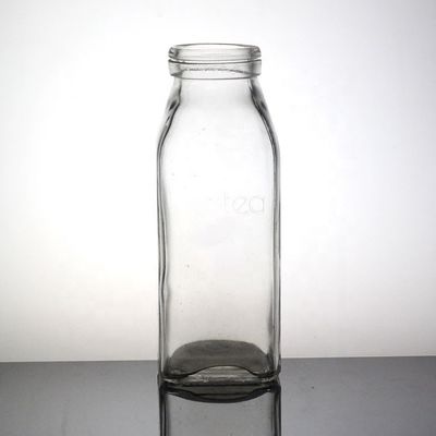 Bouteille de jus de pomme transparente en forme de 500 ml Bouteille en verre de silex avec bouchon en plastique