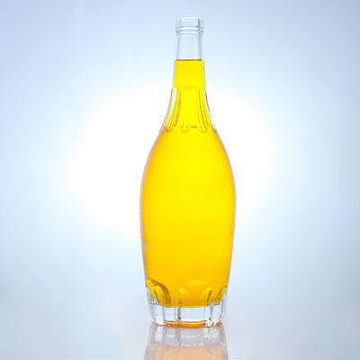Bouteille de liqueur de forme ronde avec conception en relief et bouchon de liège personnalisé