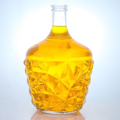 Bouteille de verre ronde décalée claire ou personnalisée pour le rhum, la vodka, le whisky et le tequila gin