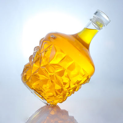 Bouteille de verre ronde décalée claire ou personnalisée pour le rhum, la vodka, le whisky et le tequila gin