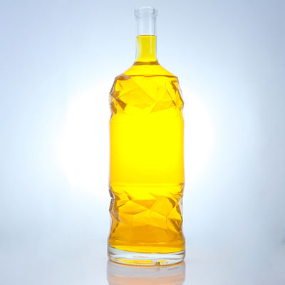 Bouteille en verre de liqueur avec logo personnalisable en relief et couleur de bouteille claire ou personnalisée