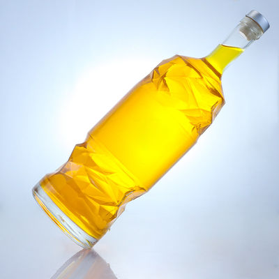 Bouteille en verre de liqueur avec logo personnalisable en relief et couleur de bouteille claire ou personnalisée