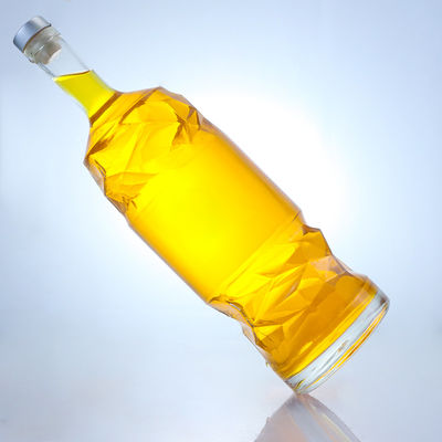 Bouteille en verre de liqueur avec logo personnalisable en relief et couleur de bouteille claire ou personnalisée