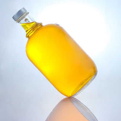 Bouteille en verre de liqueur de forme ronde avec poignée et bouchon à vis