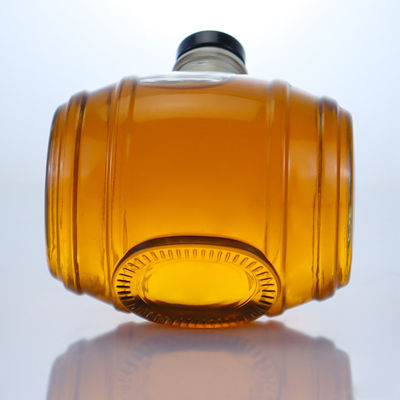 La surface décale est manipulée par une bouteille de verre de silex clair pour le gin, le rhum, le champagne, le cognac, le whisky et le liqueur 750 ml.