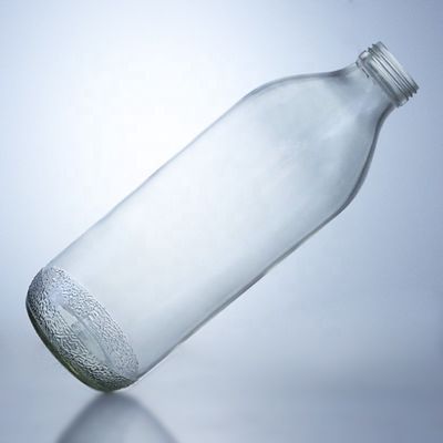 Bouteilles en verre transparentes de 1020 ml avec un bouchon à vis et une forme unique