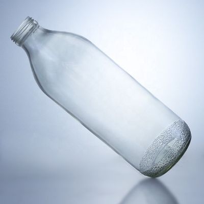 Bouteilles en verre transparentes de 1020 ml avec un bouchon à vis et une forme unique