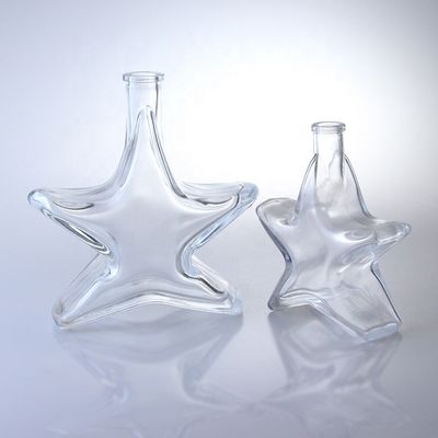 Bouteille en verre de whisky en forme spéciale avec finition en verre