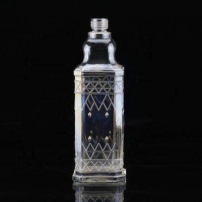 Bouteille vide en verre sculptée 500 ml 750 ml pour les spiritueux distillés de haute qualité