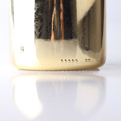 Bouteilles en verre de champagne en or sur mesure avec un bouchon en plastique pour le matériel du corps en verre