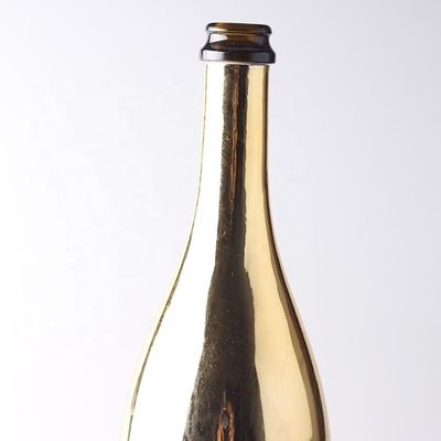 Bouteilles en verre de champagne en or sur mesure avec un bouchon en plastique pour le matériel du corps en verre